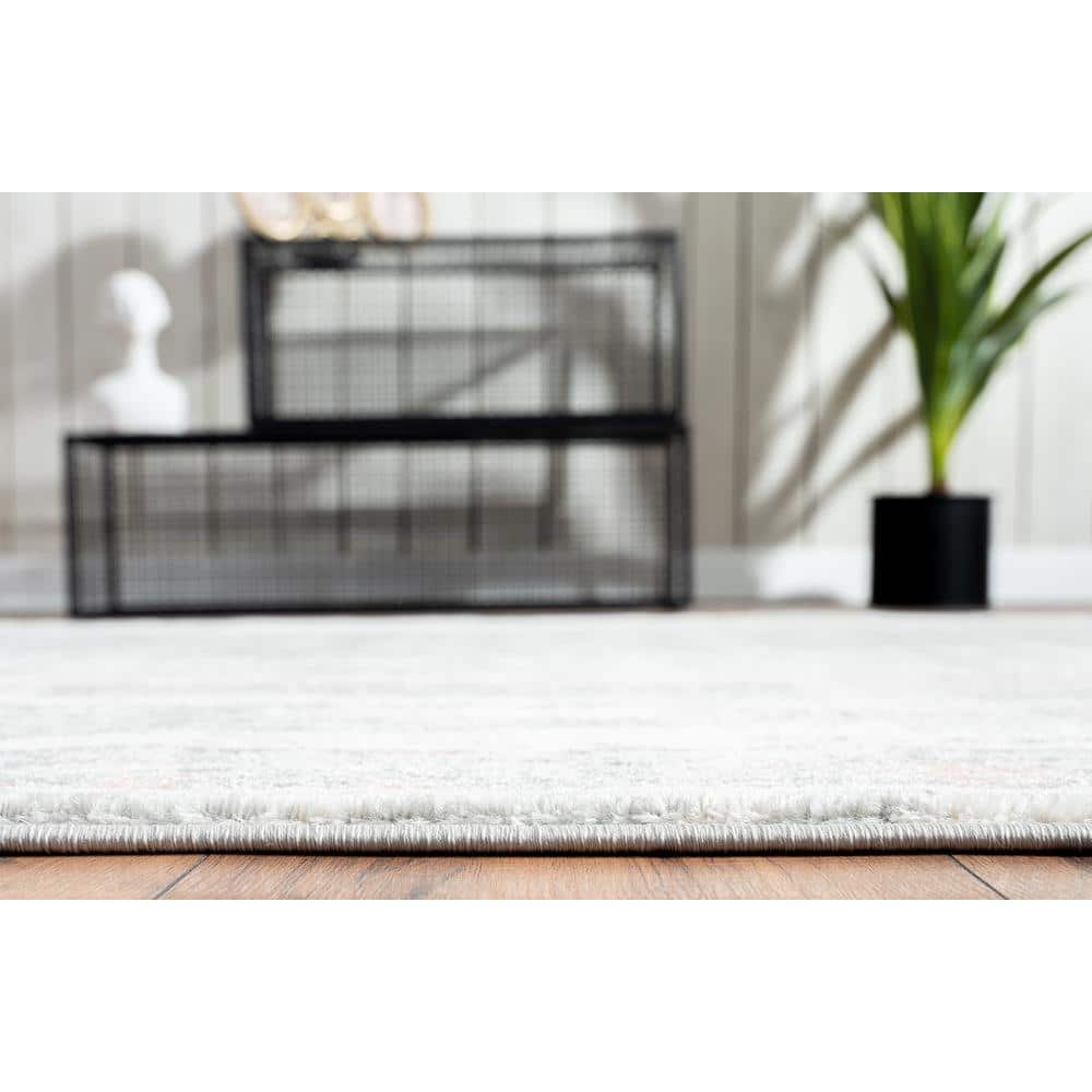 Gray and Pink Distressed Abstract 4' x 6' Synthetic Area Rug