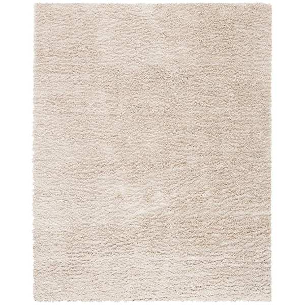 August Shag 9 ft. x 12 ft. Beige Solid Area Rug