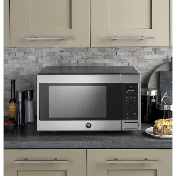 https://images.thdstatic.com/productImages/9c3e0b94-b8e0-4d5e-ab93-d5351c7e9030/svn/stainless-steel-ge-countertop-microwaves-jes1657smss-31_600.jpg