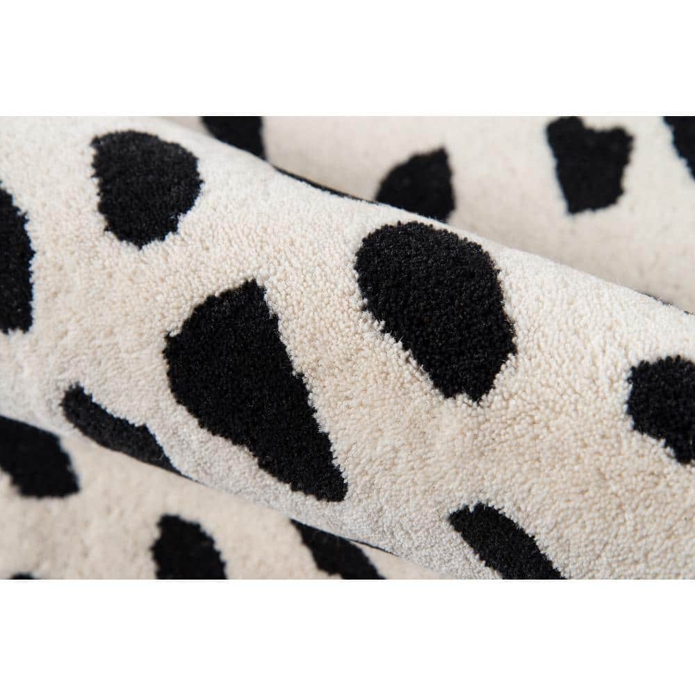 Ivory and Black Wool Geometric 8' x 10' Area Rug