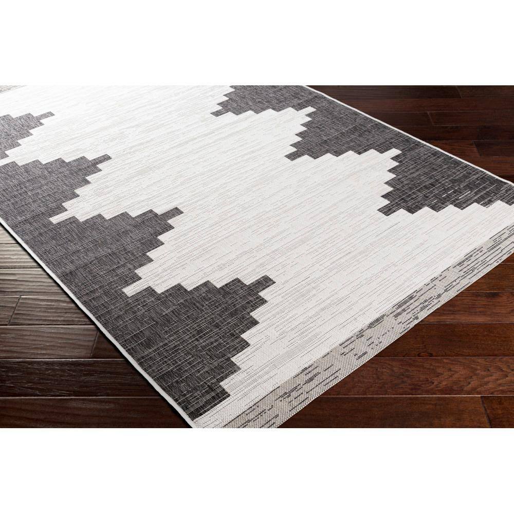 Eagean Round Black Synthetic Stain-Resistant Area Rug
