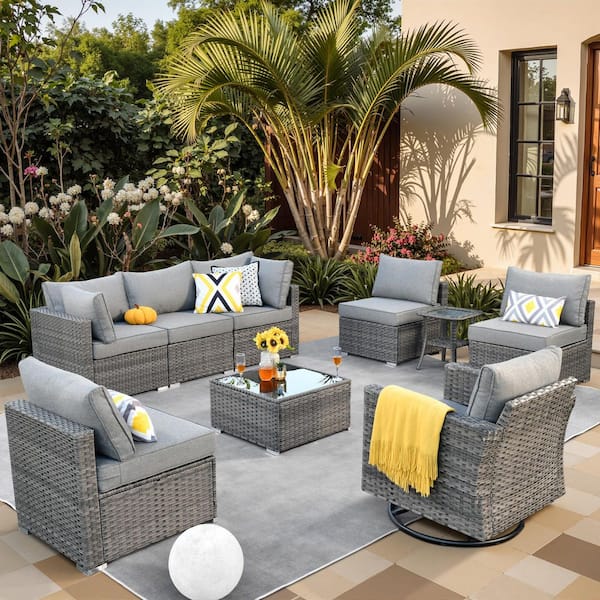 Sanibel Gray 9-Piece Wicker Outdoor Patio Conversation Sofa Set with a Swivel Rocking Chair and Dark Gray Cushions