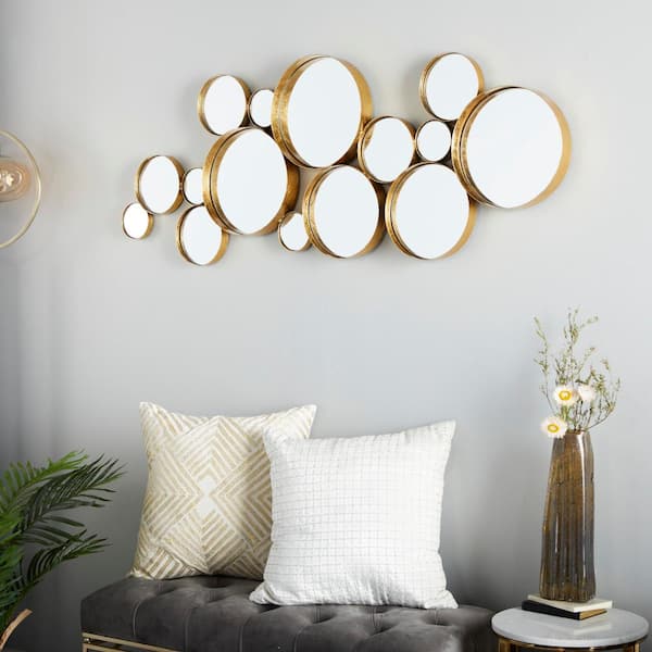CosmoLiving by Cosmopolitan 21 in. x 54 in. Bubble Cluster Round Framed Gold Wall Mirror