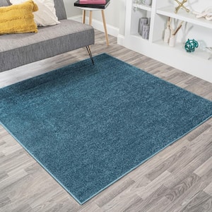 Haze Solid Low-Pile Turquoise 6' Square Area Rug
