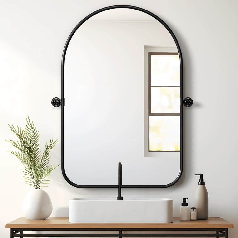 24 in. W x 35 in. H Arched Metal Framed Pivoted Bathroom Wall Vanity Mirror