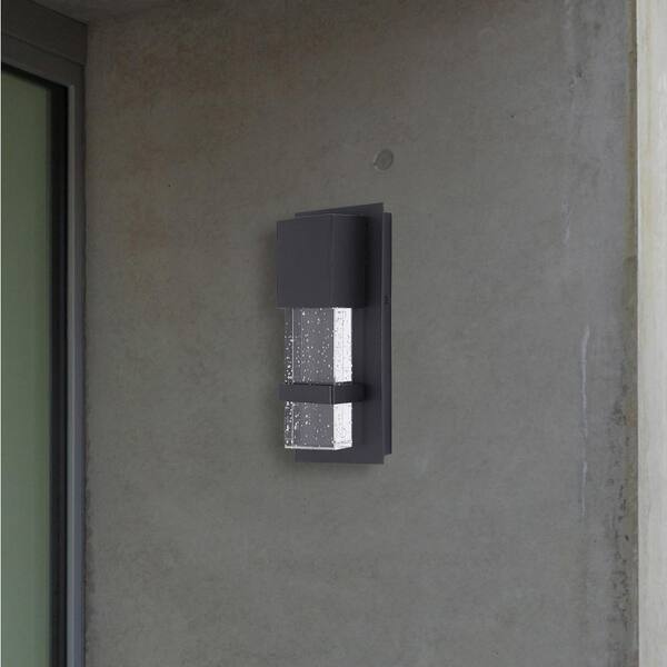 Venecia 4.76 in. W x 10 in. H 1-Light Matte Black Integrated LED Outdoor  Wall Lantern Sconce with Clear Seeded Glass