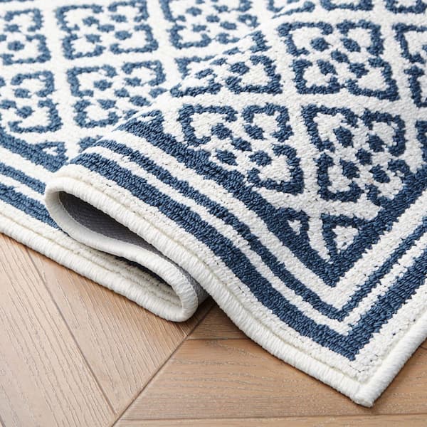 Isla 2-Tone Dusty Navy/Ivory 2 ft. x 6 ft. Tufted Geometric Polypropylene Area Rug