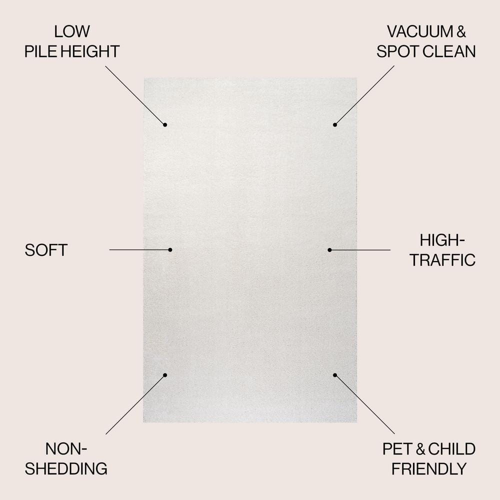 Cream Solid Synthetic Low-Pile Reversible Area Rug 8 x 10