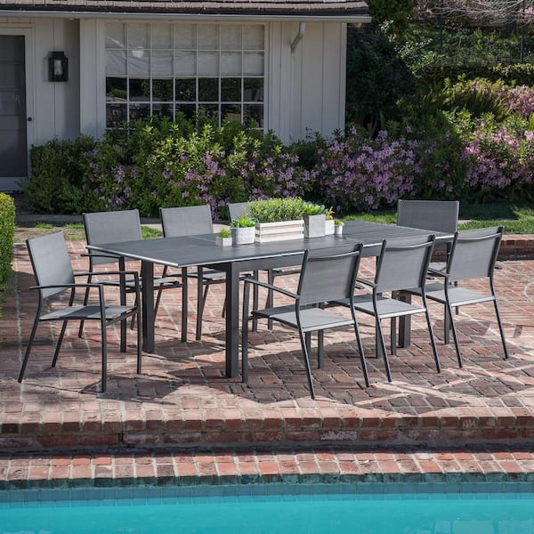 Hanover Cameron 9-Piece Aluminum Outdoor Dining Set with 8 Sling Dining Chairs and an Expandable Table