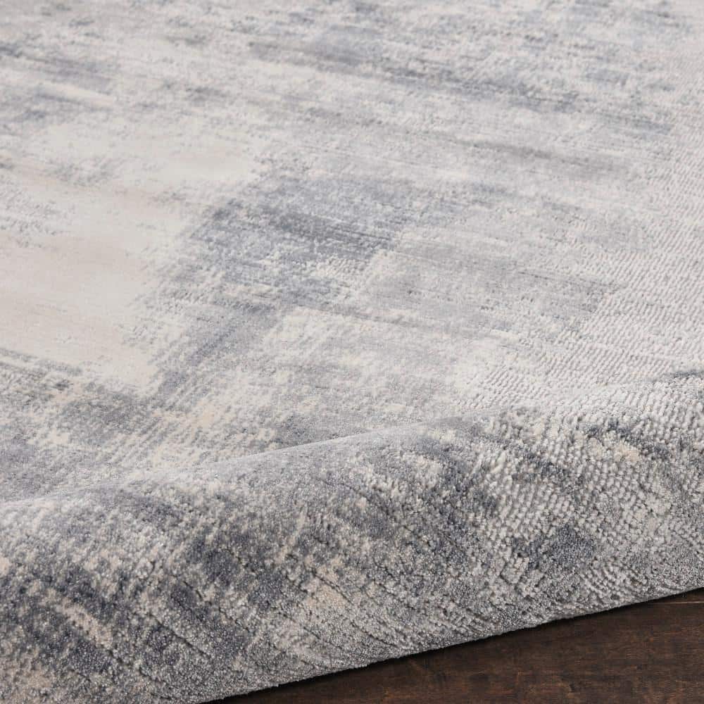 Round Blue and Ivory Abstract Area Rug 7'10"