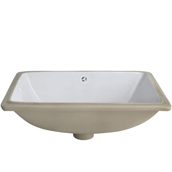 Undermount Porcelain Bathroom Sink in White with Pop-Up Drain in Brushed Nickel Undermount Porcelain Bathroom Sink in White with Pop-Up Drain in Brushed Nickel