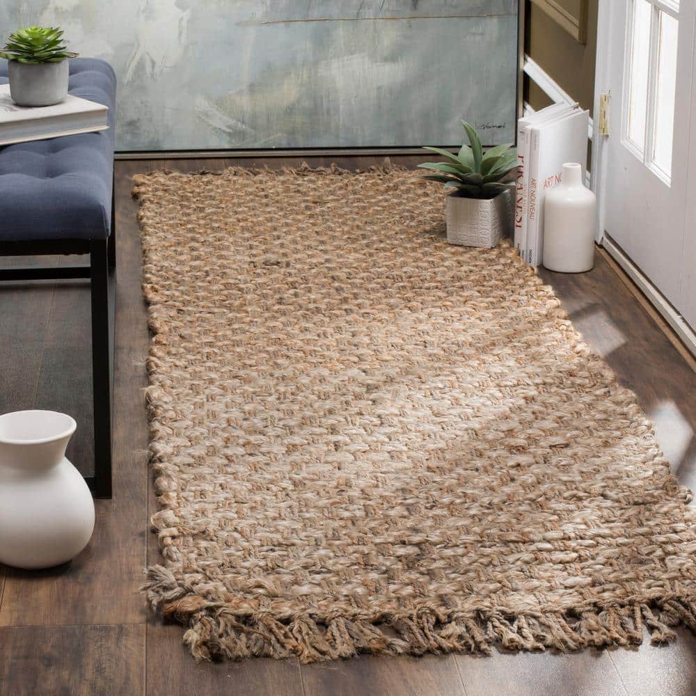 https://images.thdstatic.com/productImages/9ccac43b-8f6d-41dc-af86-a5c232b38745/svn/beige-safavieh-area-rugs-nf856a-210-e1_1000.jpg