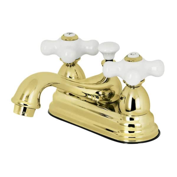 Kingston Brass Restoration 4 in. Centerset 2-Handle Bathroom Faucet with Brass Pop-Up in Polished Brass