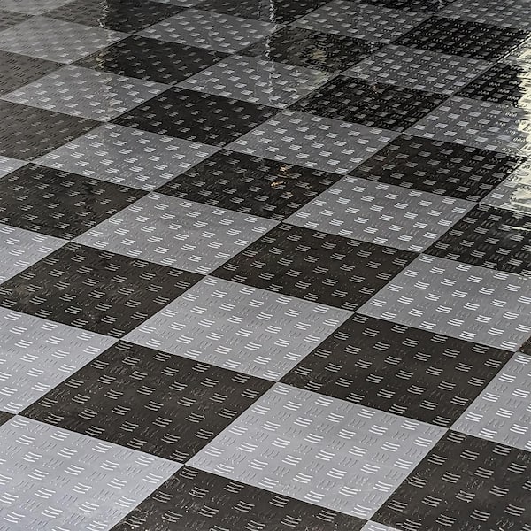 https://images.thdstatic.com/productImages/9d22eda4-2206-46bb-971c-2e776d3988ca/svn/dark-gray-greatmats-garage-flooring-tiles-gftb-diam-25dgy-44_600.jpg