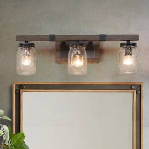 Rustic Grayish Black Farmhouse Vanity Light with Mason Jar Shades and Textured Brown Faux Wood Grain 3-Light Wall Sconce