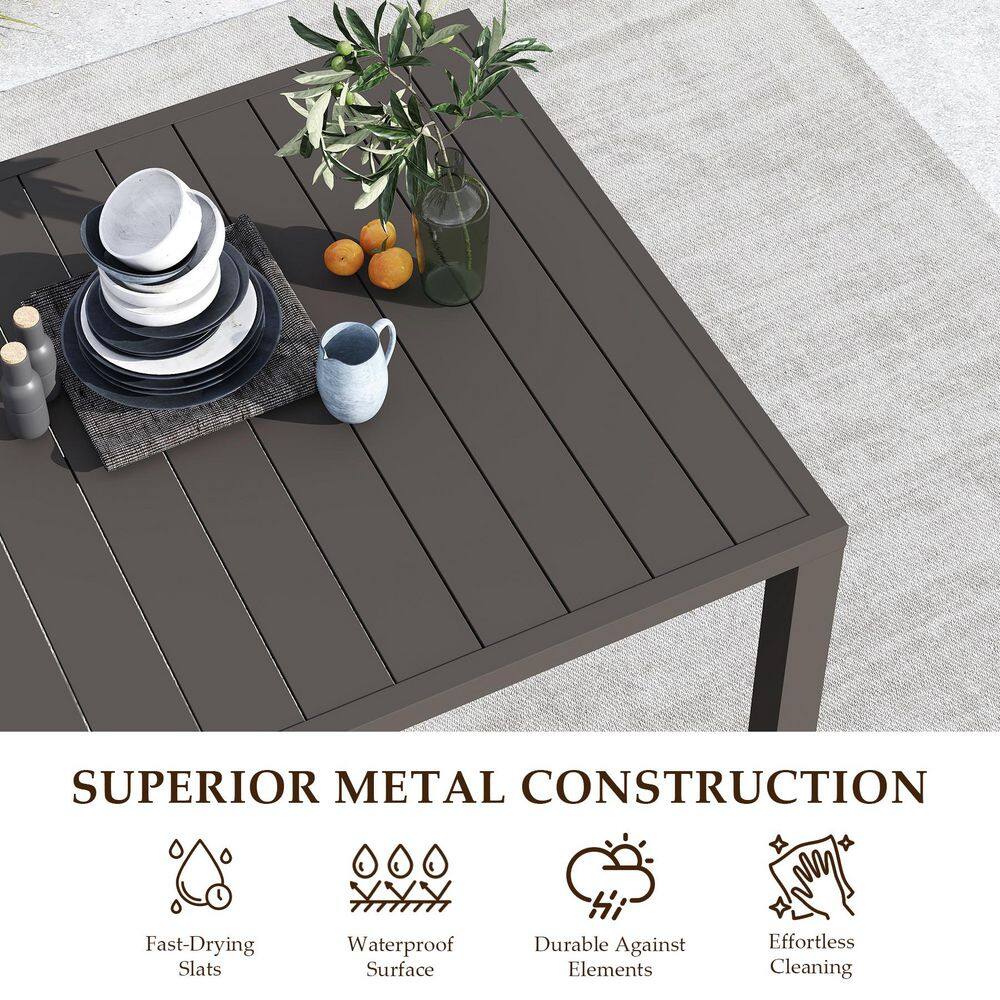 Close-up view of the black slatted metal tabletop.