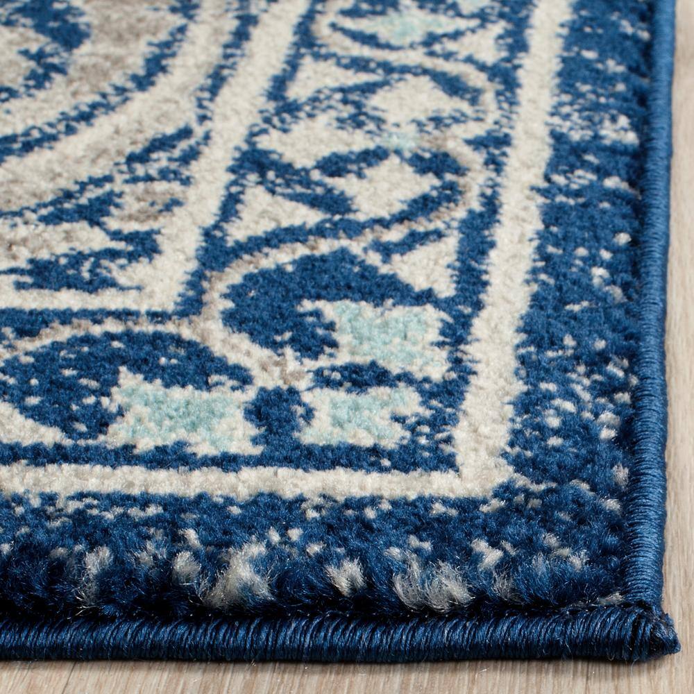 Blue and Ivory Floral High Pile Synthetic Area Rug 8' x 10'