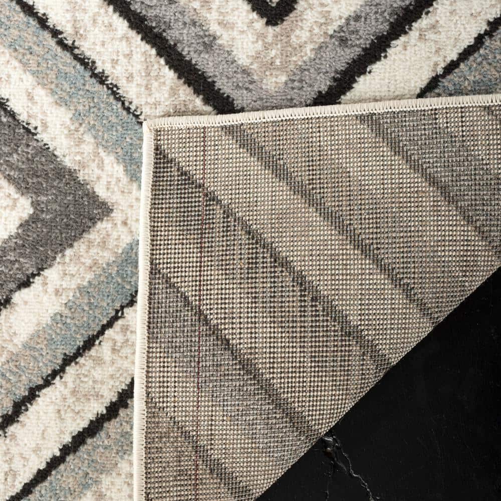 Cream and Beige Geometric Diamond Area Rug 6'7" x 9'2"
