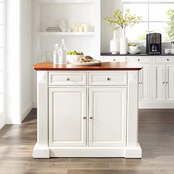 https://images.thdstatic.com/productImages/9d9810e1-56ea-40a2-8736-f4fdff8be0b0/svn/white-crosley-furniture-kitchen-islands-kf30007wh-44_600.jpg