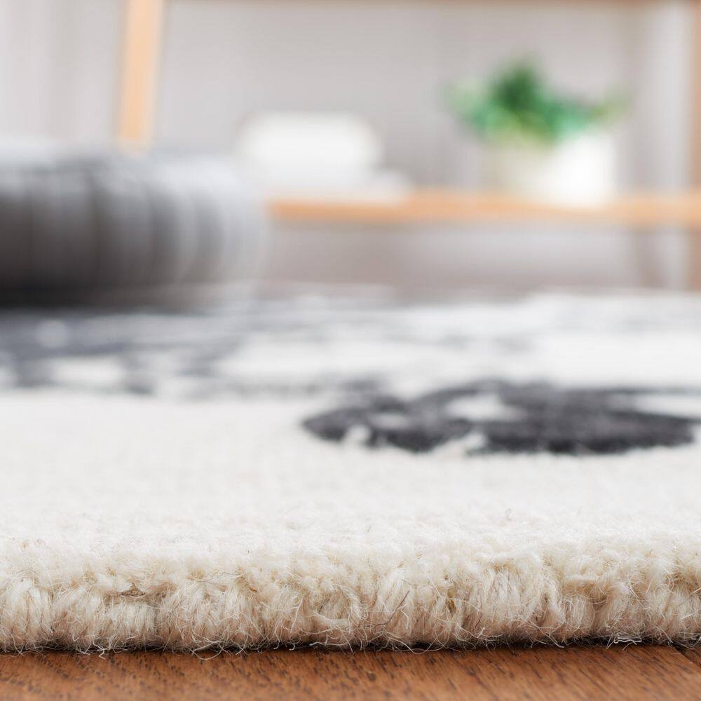 Ivory and Black Floral Hand-Tufted Wool Round Rug
