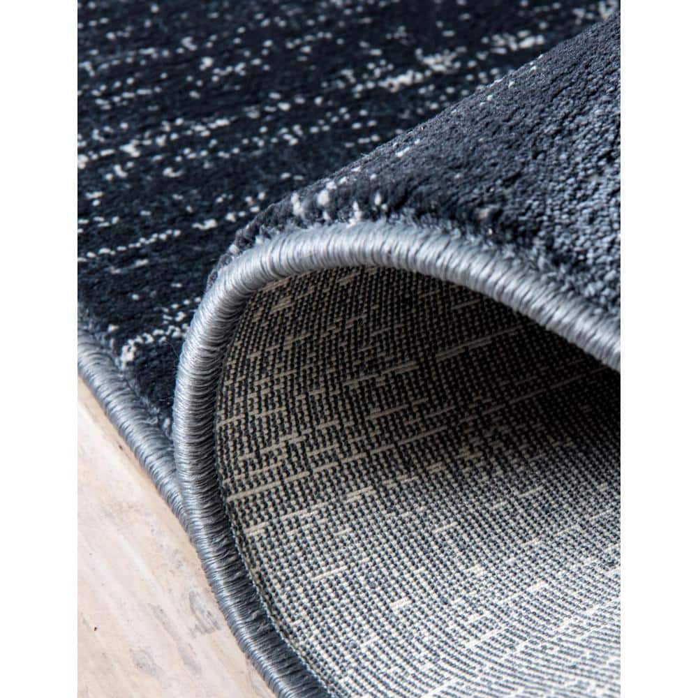 Navy Blue and Ivory 9' x 12' Easy-Care Synthetic Area Rug