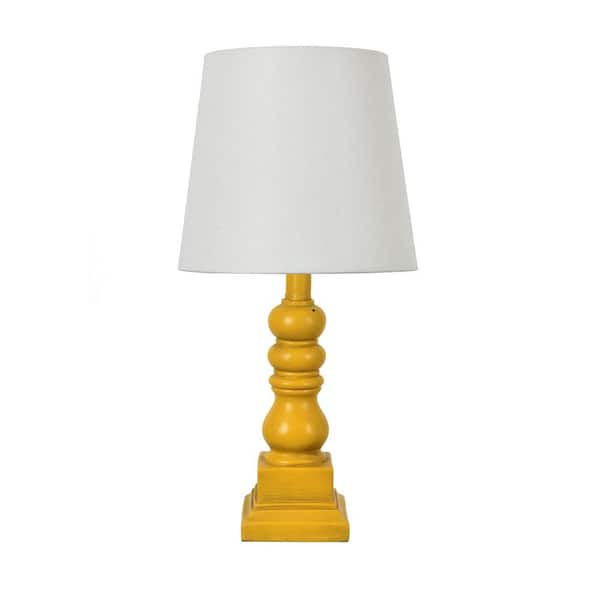 CRESTVIEW COLLECTION Lawrence Distressed Yellow Resin Table Lamp