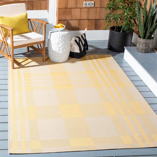 https://images.thdstatic.com/productImages/9dc60c9a-e400-4b5c-a671-7228624cf3e9/svn/gold-beige-safavieh-outdoor-rugs-cy6201-306-9-e1_600.jpg