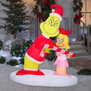 5.5 ft. H x 3 ft. W x 4 ft. L  LED Lighted Christmas Inflatable Airblown-Grinch Passing Out Candy Canes to Cindy Lou-LG