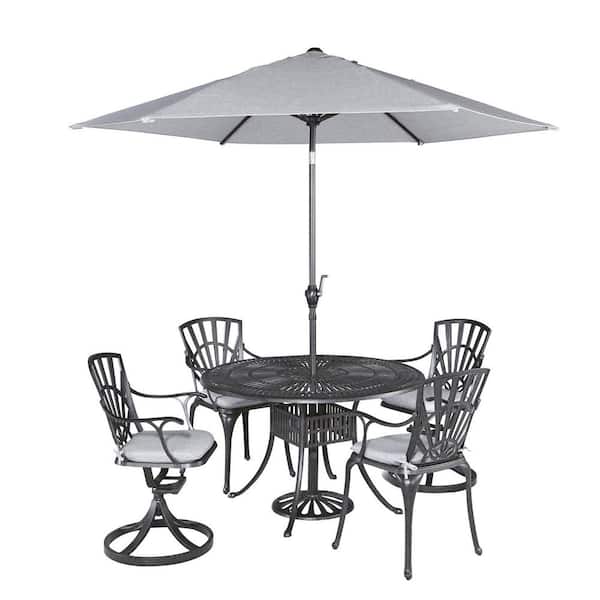 HOMESTYLES Grenada Charcoal Gray 48 in. 5-Piece Cast Aluminum Round Outdoor Dining Set with Umbrella with Gray Cushions