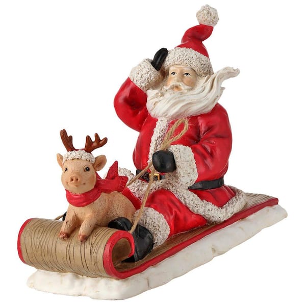 8 in. Resin  Santa With Pig On Sled