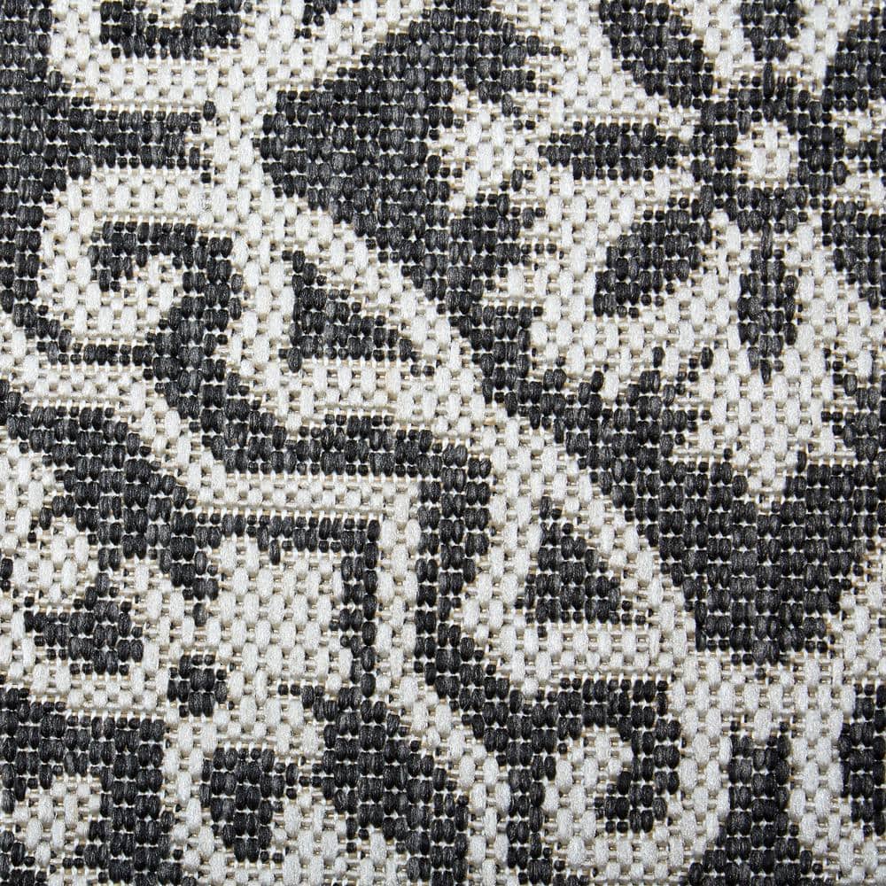 Danica 5'2" x 7'2" Black/Gray Synthetic Medallion Area Rug