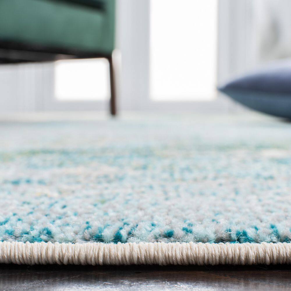 Light Blue and Green Abstract Distressed Synthetic Area Rug
