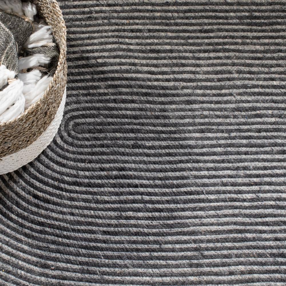 Gray and Black Oval Braided Wool Area Rug 6' x 9'