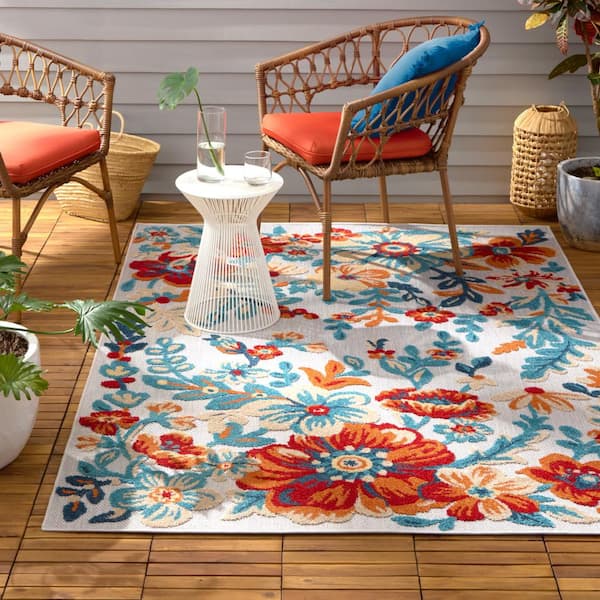 5' x 7' Ivory Orange and Blue Floral Stain Resistant Indoor Outdoor Area Rug 5' x 7' Ivory Orange and Blue Floral Stain Resistant Indoor Outdoor Area Rug