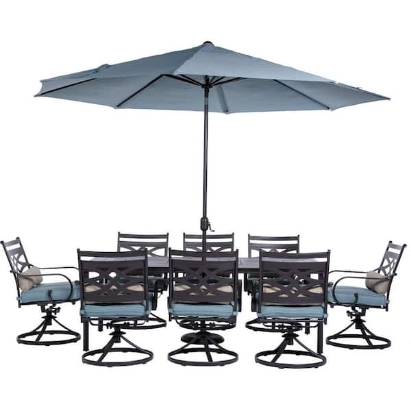 Hanover Montclair 9-Piece Steel Outdoor Dining Set with Ocean Blue Cushions, 8 Swivel Rockers, 42x84 in. Table and Umbrella