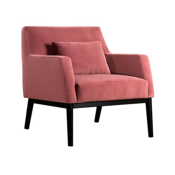 pink velvet chair with wooden legs