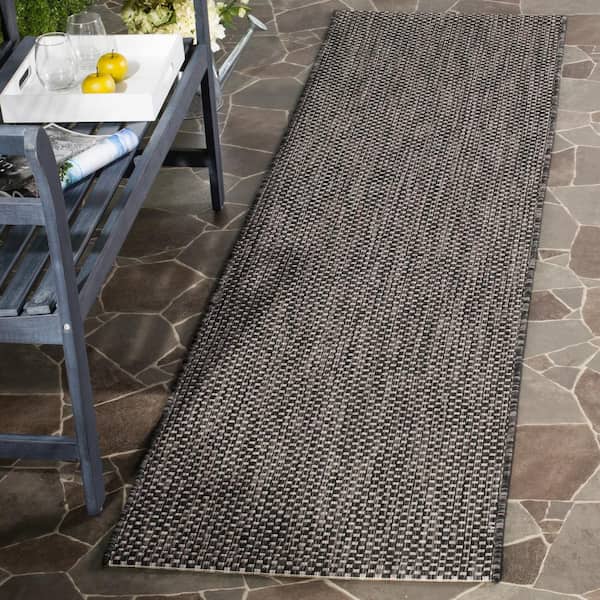 Courtyard Black/Beige 2 ft. x 18 ft. Solid Distressed Indoor/Outdoor Patio  Runner Rug