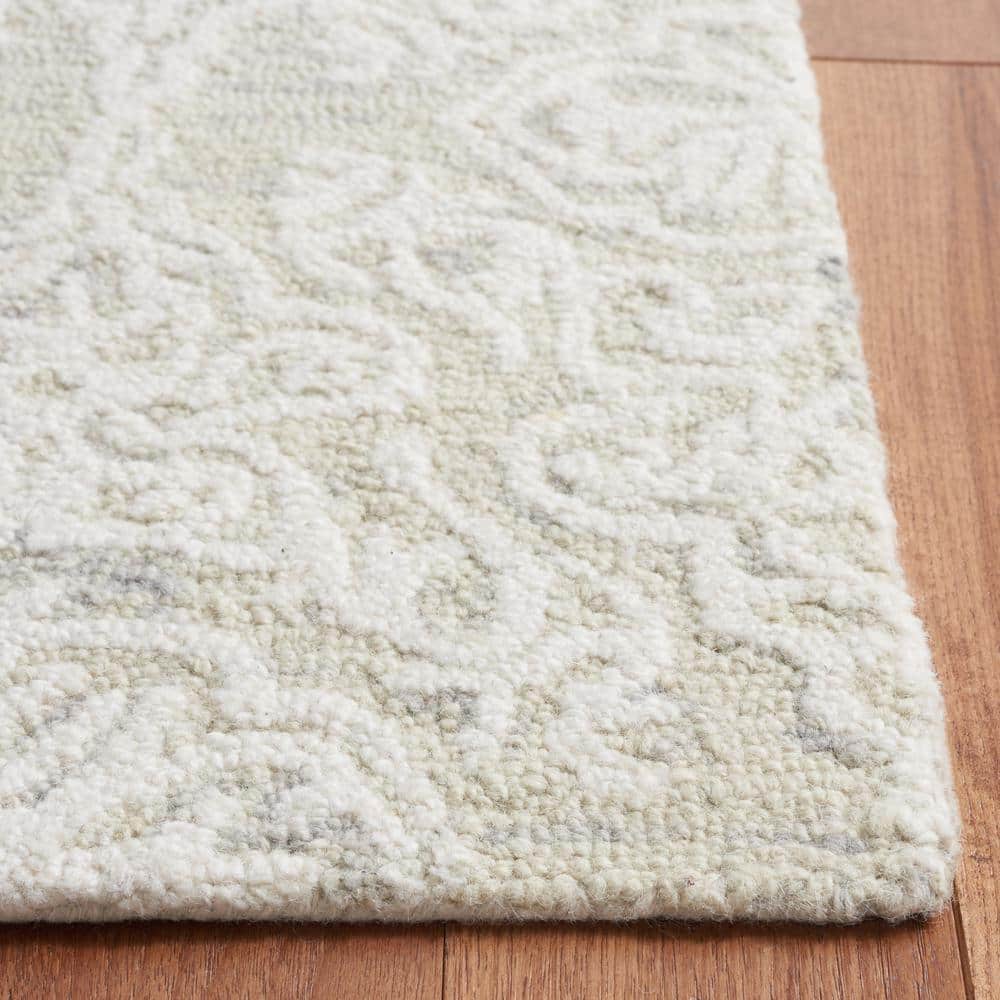Ivory Floral Hand-Tufted Wool 8' x 10' Area Rug