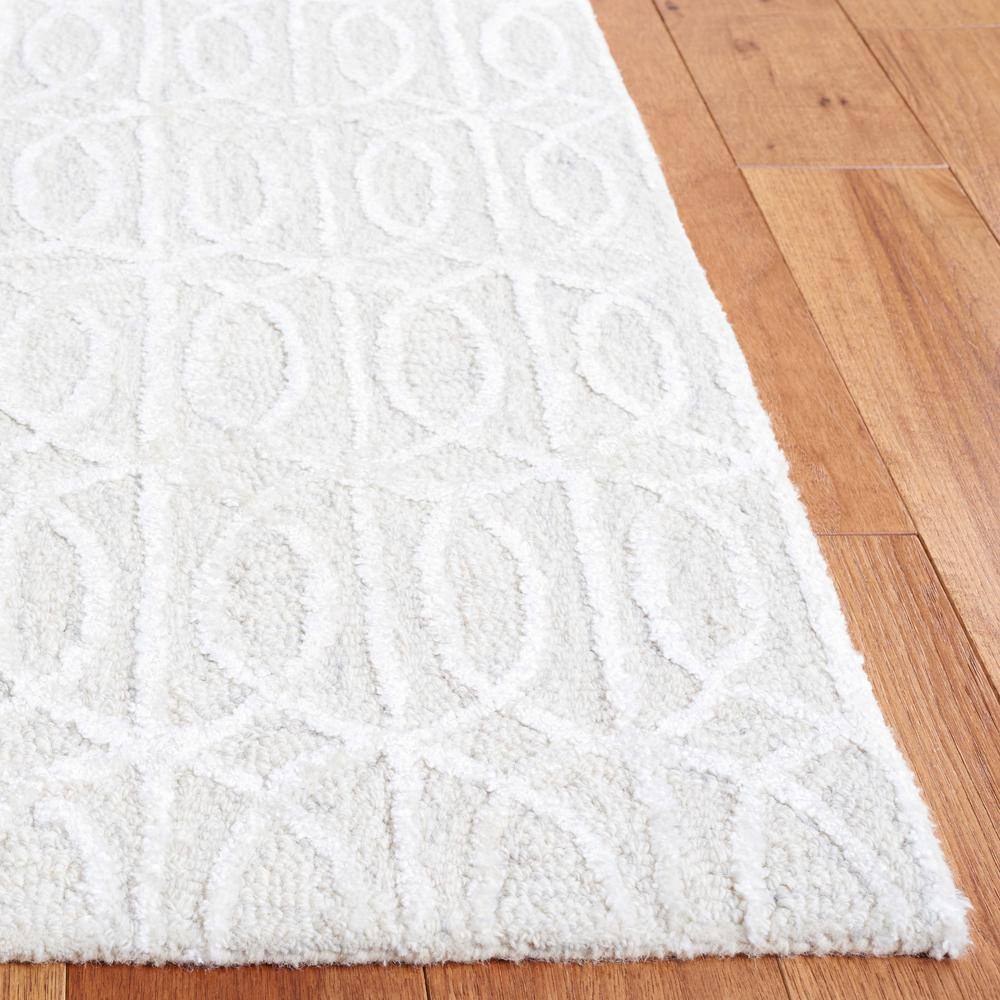 Beige and Ivory Tufted Wool and Viscose 6' x 9' Area Rug