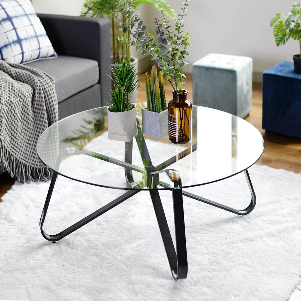 Small round glass top coffee outlet table