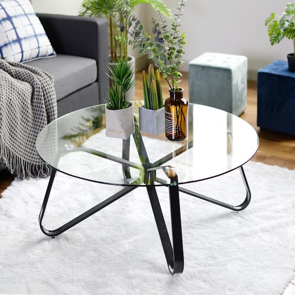 https://images.thdstatic.com/productImages/9e4a7660-5ec9-4987-8247-0928a70d66bf/svn/clear-coffee-tables-konya-glass-80cm-a-64_600.jpg