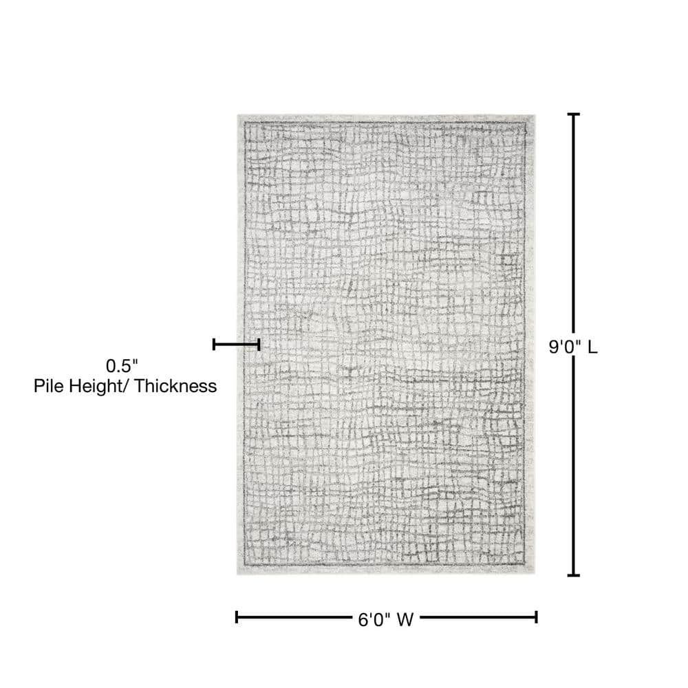 Ivory and Silver Rectangular Synthetic Area Rug, 6' x 9'