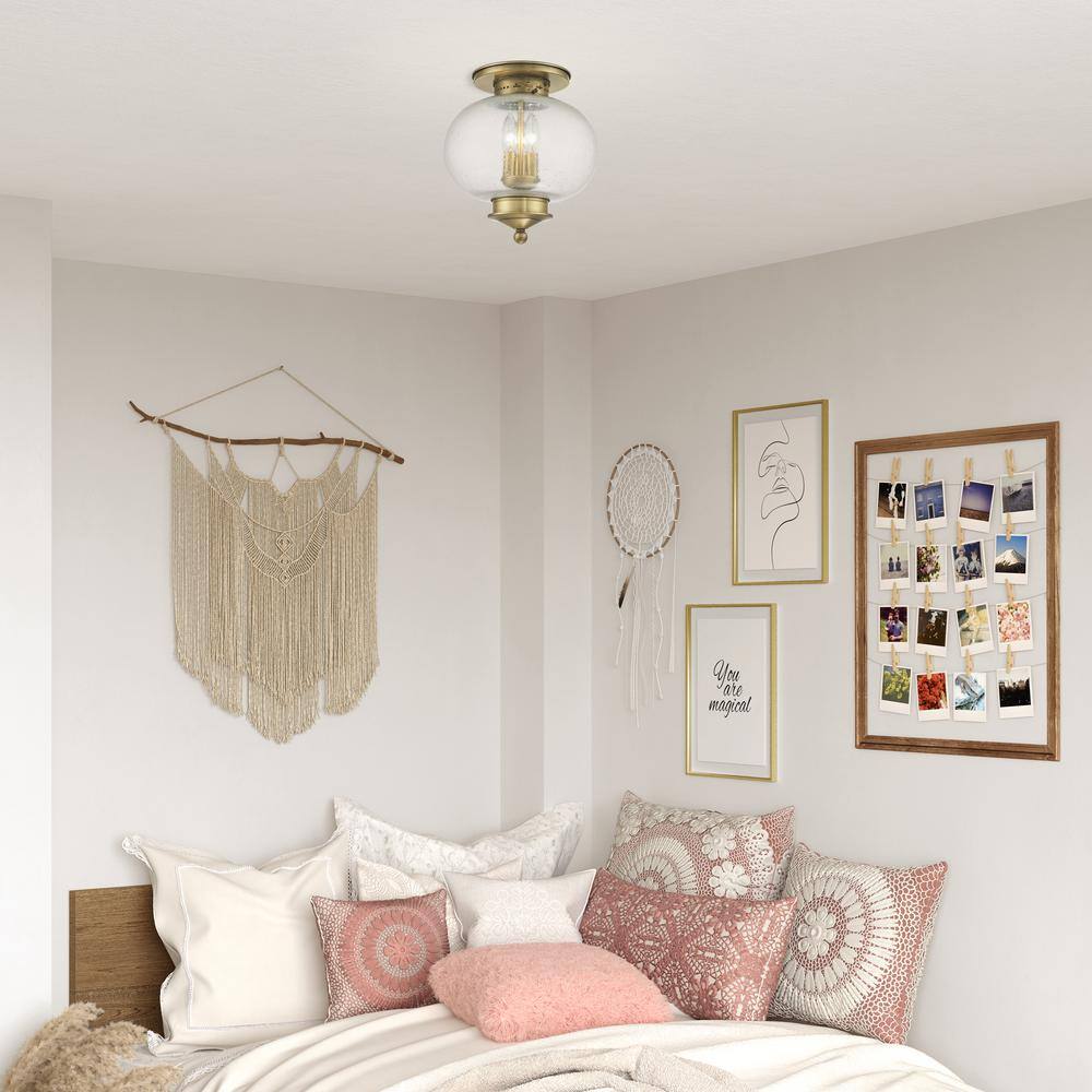Harbor Antique Brass Globe LED Flush Mount with Hand Blown Seeded Glass