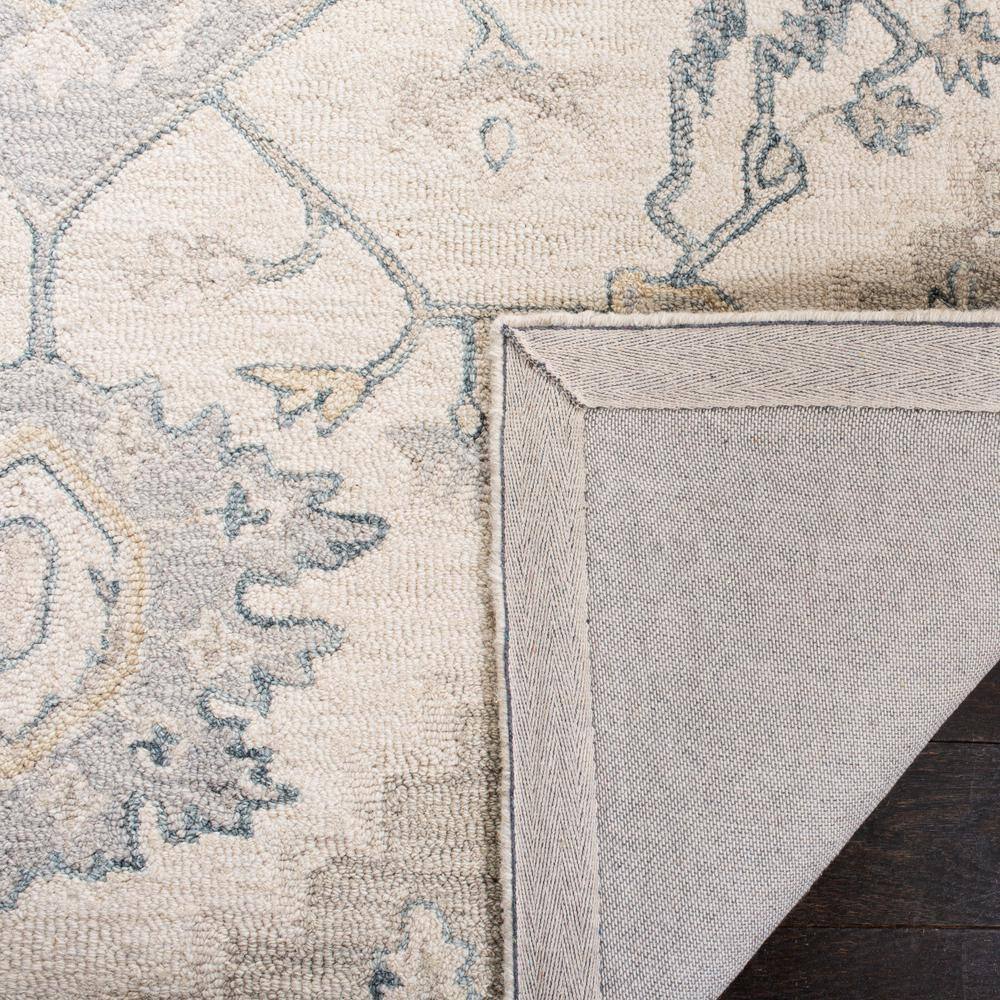 Ivory & Beige Handmade Wool Medallion Area Rug - 2'3" x 5'