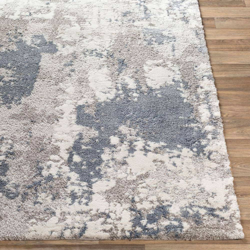 Blue and Beige Abstract 9' x 12' Synthetic Area Rug