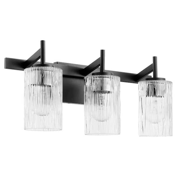 Quorum International 3-Light - 100-Watt Medium Lamp Base Light  Vanity 21 in. Width with 3 Clear Fluted Glass Diffusers Textured Black