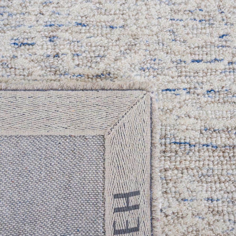 Ivory and Light Blue Floral Wool 8' x 10' Hand-Tufted Rug