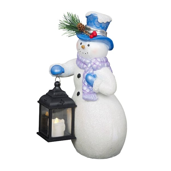 Alpine Corporation Lavender Winter Snowman Holding Lantern Statue