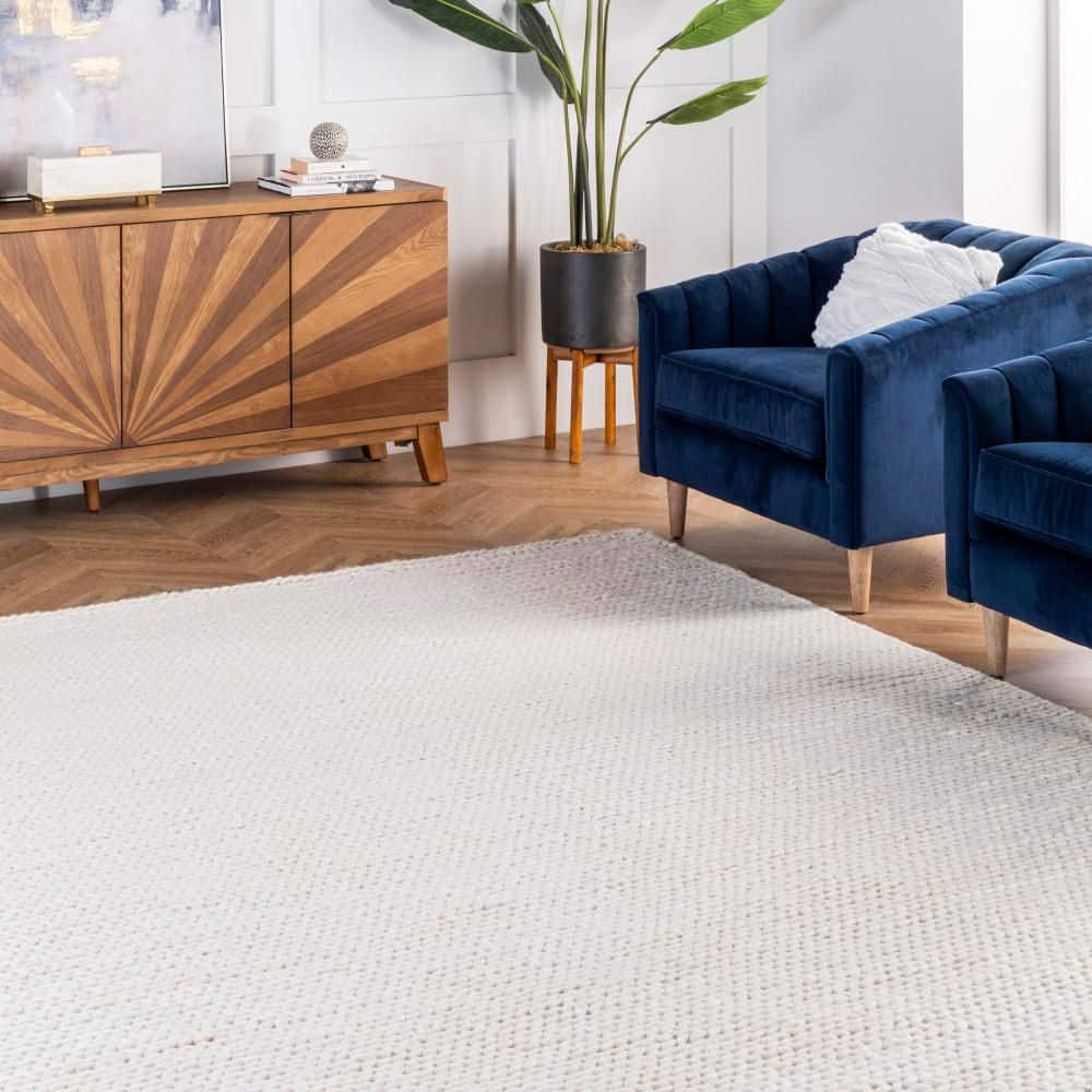 Handmade Off-White Braided Wool 4' x 6' Area Rug