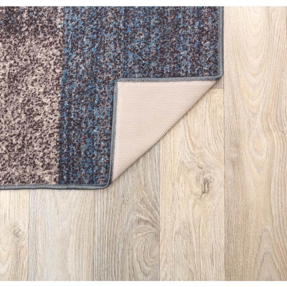 Blue Geometric Tufted Synthetic Rectangular Area Rug 6'6" x 9'